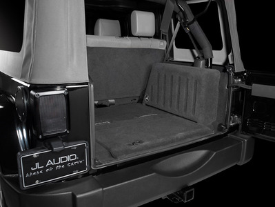 JL Audio offers a Stealth Subwoofer Enclosure for 2007 and up Jeep Wrangler Unlimited
