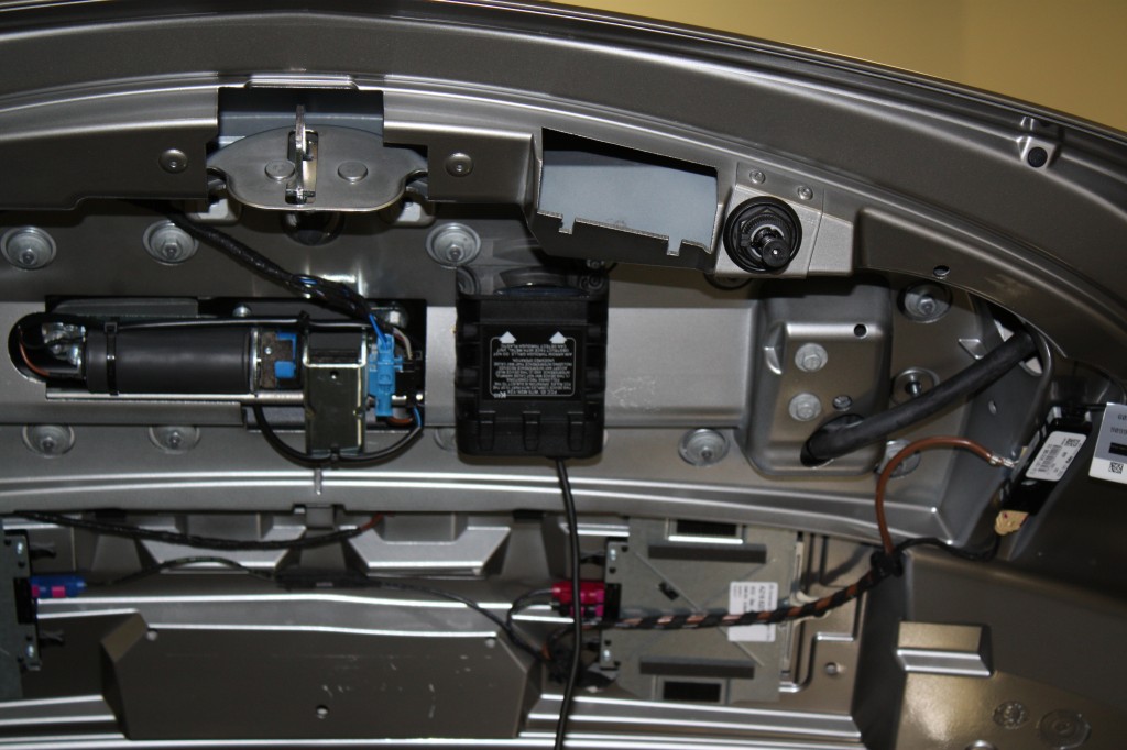 Stealth install of rear radar sensor in trunk lid of Mercedes SLS AMG