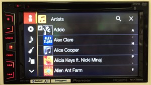Pioneer Double Din AVH-X2700BS displays Artist list with album art.