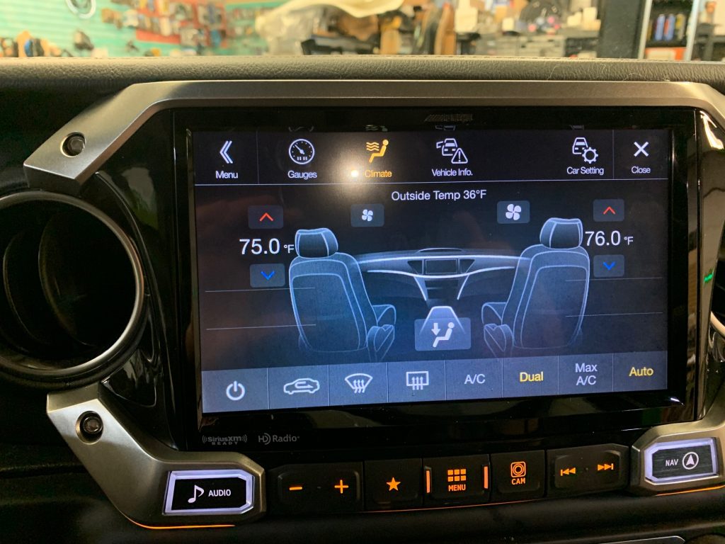 Alpine X409-WRA-JL retains OEM HVAC controls and display.