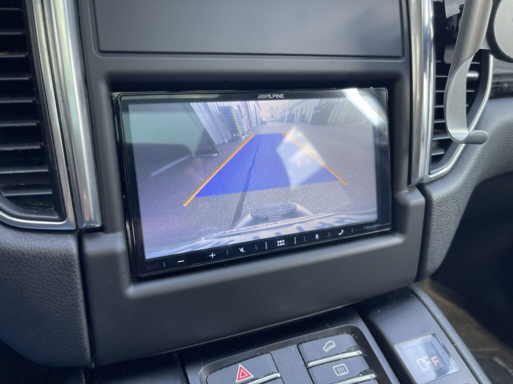 Porsche Macan aftermarket stereo installation - reverse camera retained.